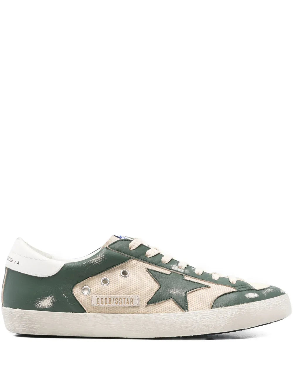 Beige and green leather low-top sneakers with star patch, lace-up front, white sole
