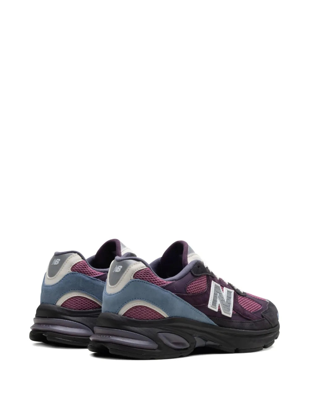 New Balance X Kith 2010 sneaker, rear three-quarter view in dark purple and black