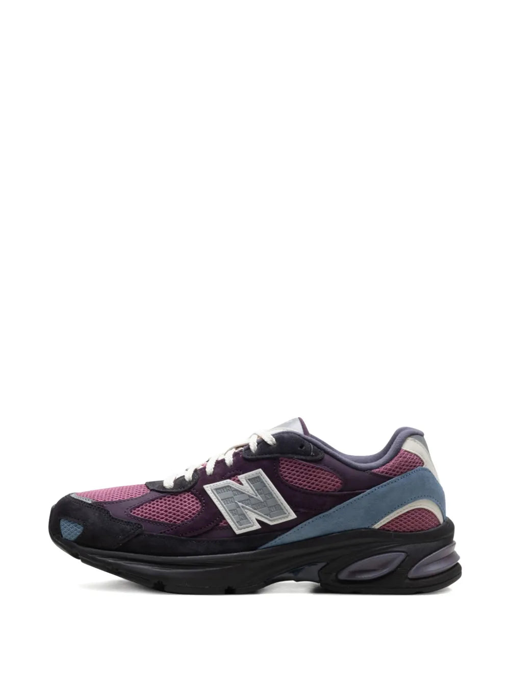 New Balance X Kith 2010 sneaker, front three-quarter view in dark purple and black