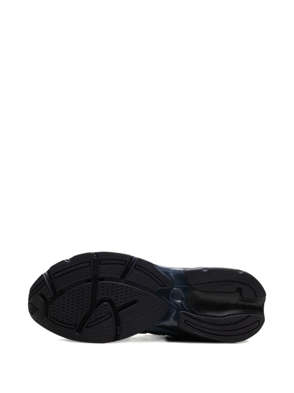 New Balance X Kith 2010 sneaker outsole view with dark tread and blue heel accent