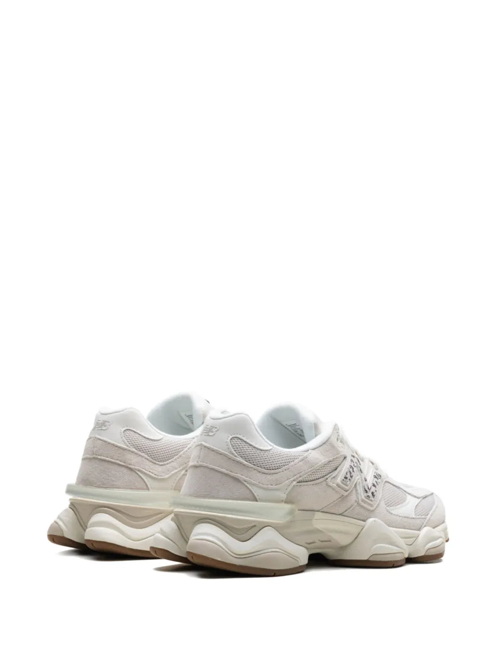 White chunky sneakers with back heel overlay and cream midsole
