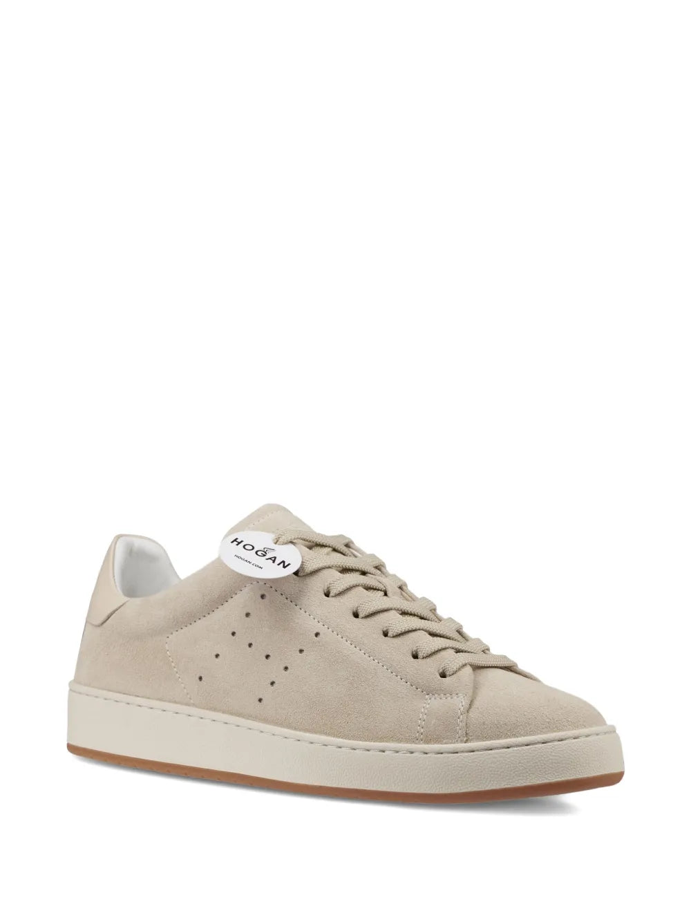 Beige suede lace-up sneakers with lace eyelets and tongue logo patch