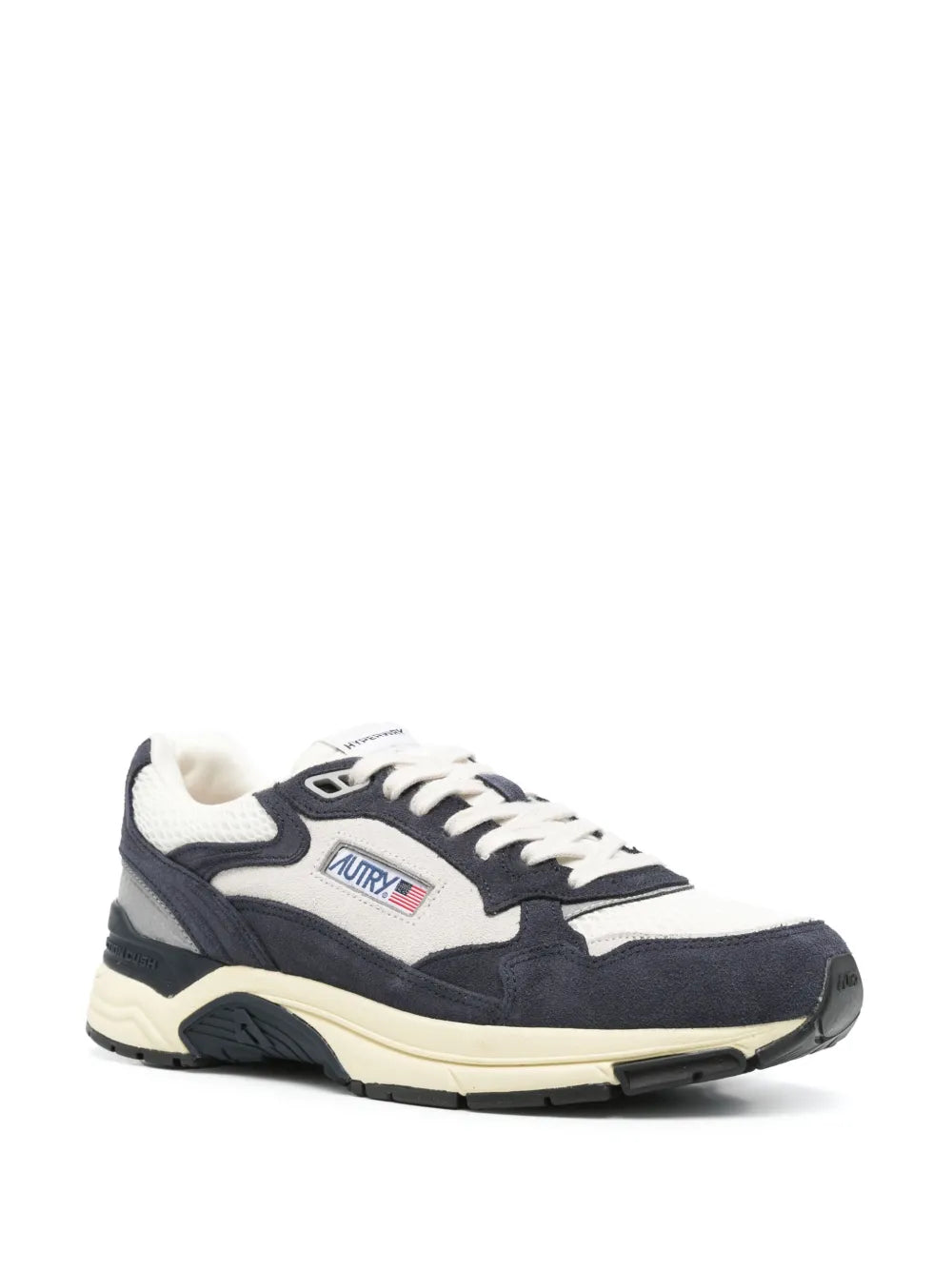 Navy and white lace-up low-top sneakers with side logo patch and cream midsole