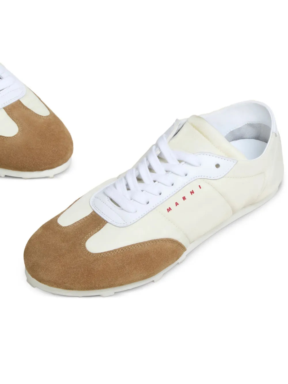 Marni suede-detail sneaker close-up: white laces, brown suede toe and side panels