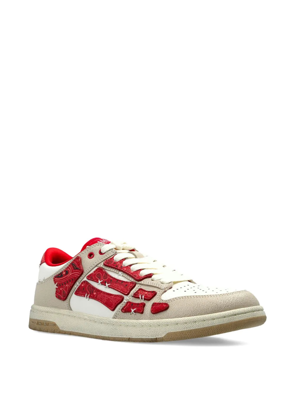 Low-top sneakers, cream upper with red patchwork graphics and white laces