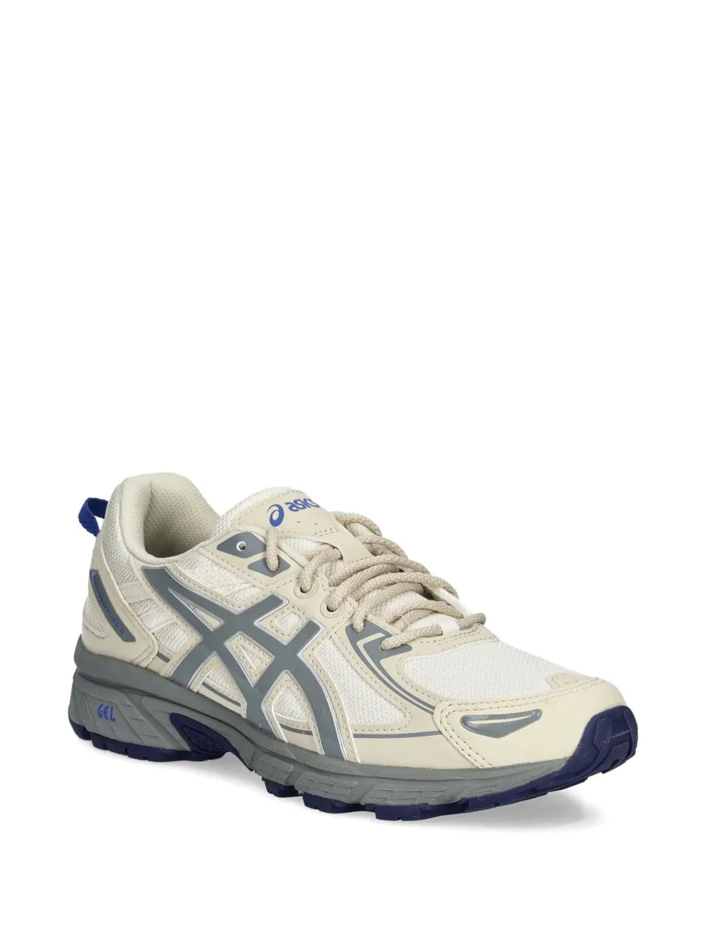 Ecru Asics sneakers with blue heel overlay, lace-up front, and rugged midsole