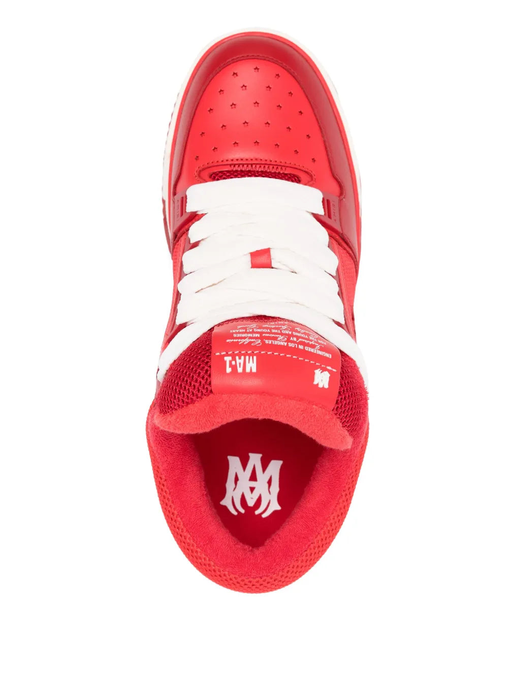 Red low-top sneakers top view with white laces and perforated toe