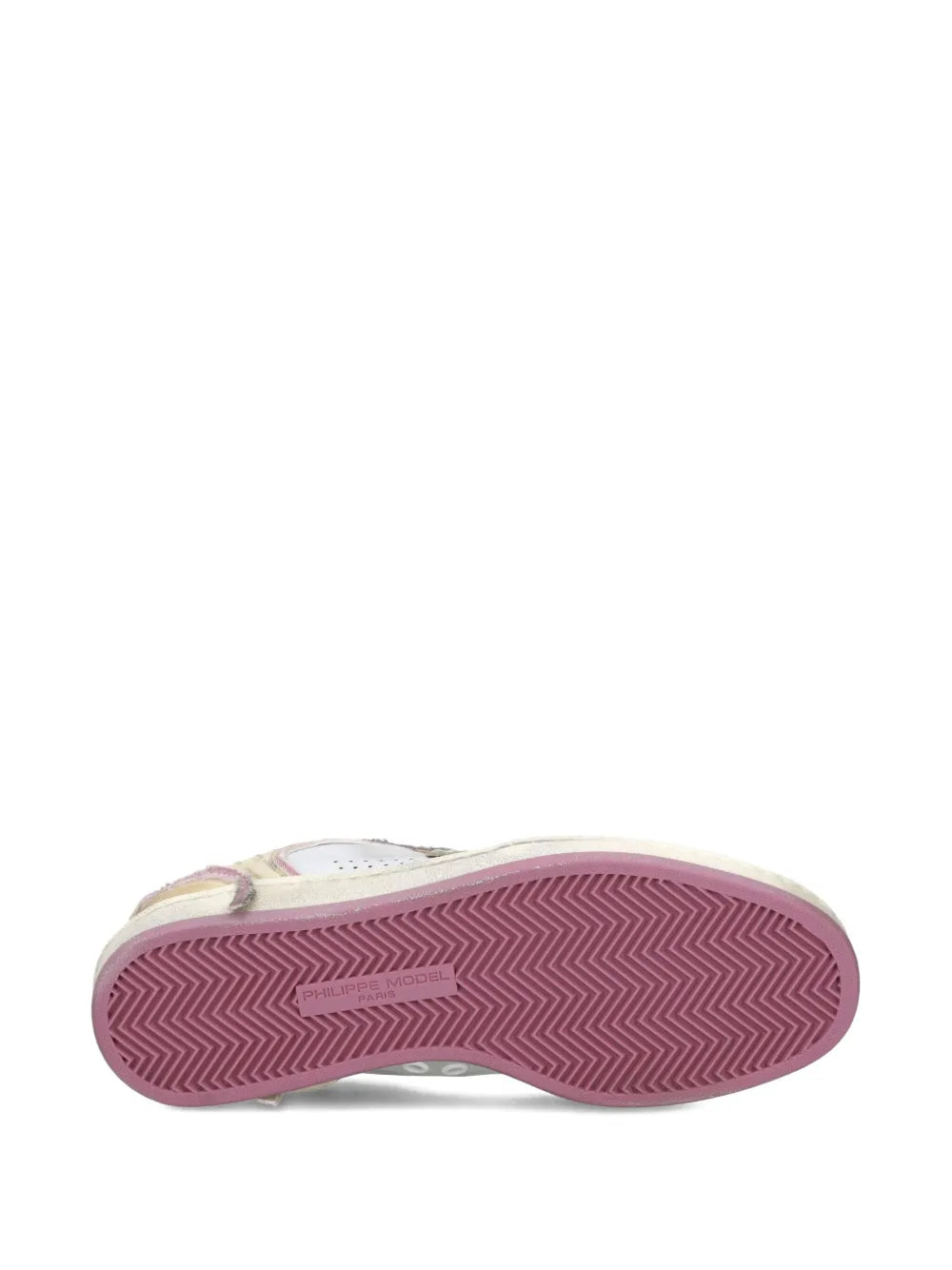 Low-top sneaker outsole with zigzag tread pattern in purple and off-white