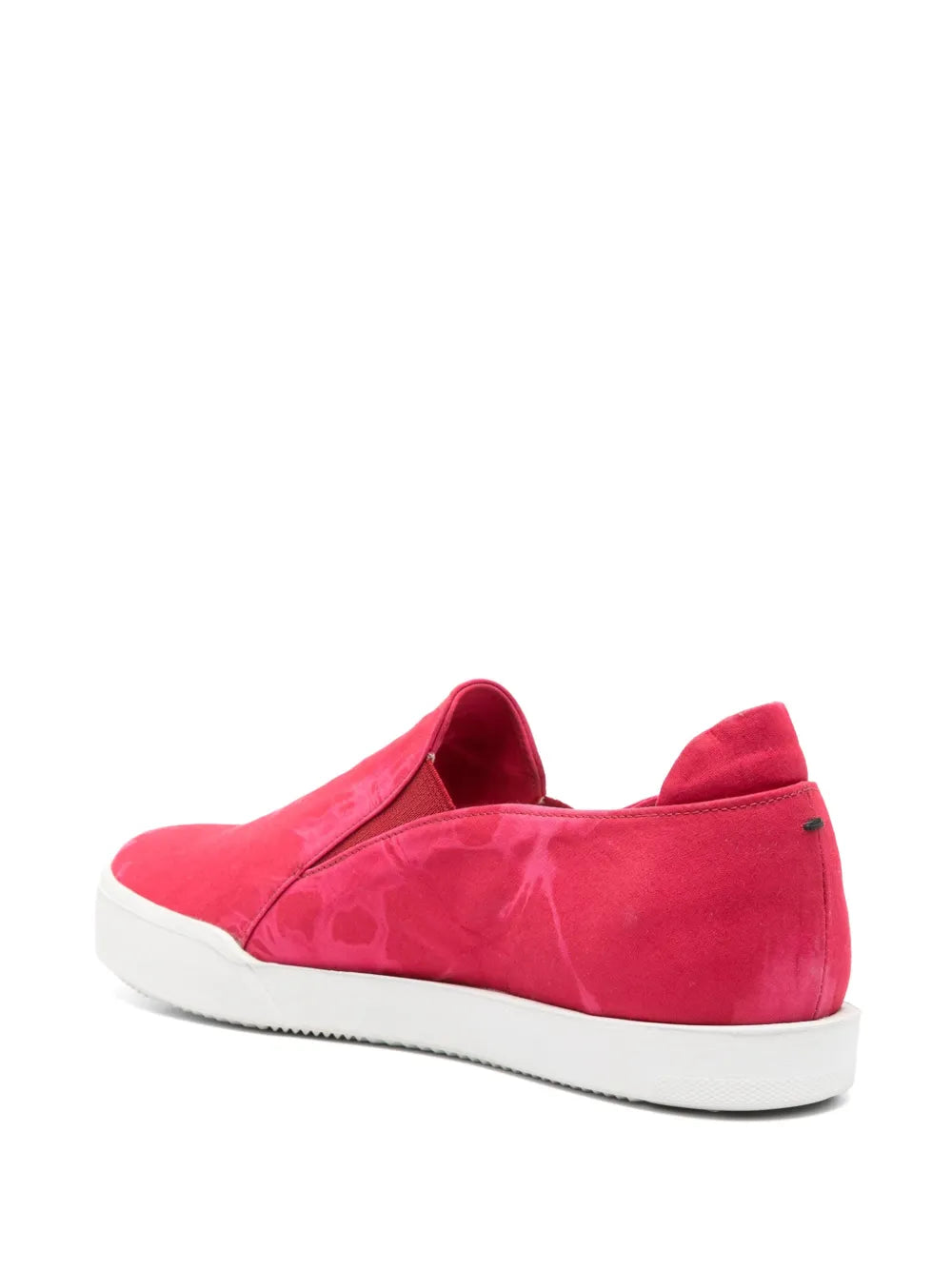 Pink tie-dye slip-on sneaker, back/side angle with white sole