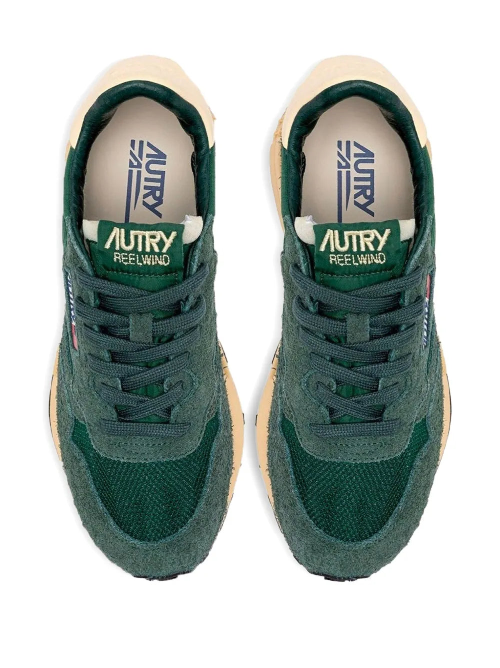 Pair of green lace-up sneakers with beige heel lining and tongue logo, tan gum soles