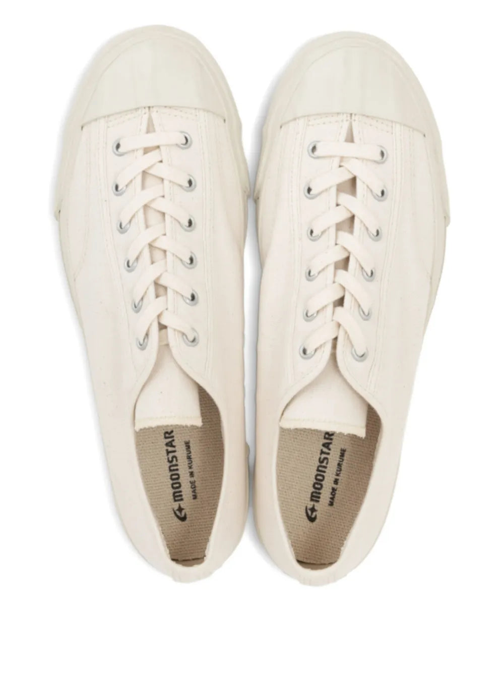 Pair of white canvas sneakers, lace-up with Moonstar logo on inner lining