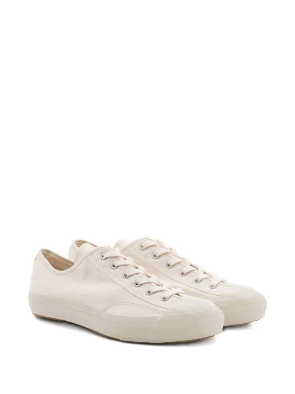 White canvas lace-up sneakers, classic low-top design with stitched panels