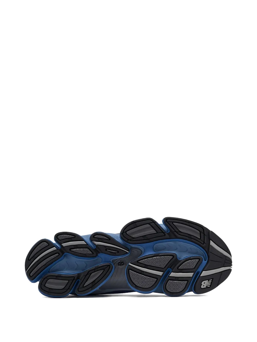 Black and blue New Balance sneaker outsole with textured traction pattern
