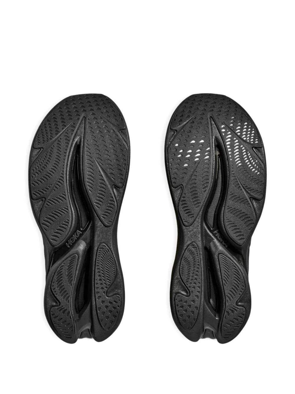Pair of black rubber outsoles with deep traction tread
