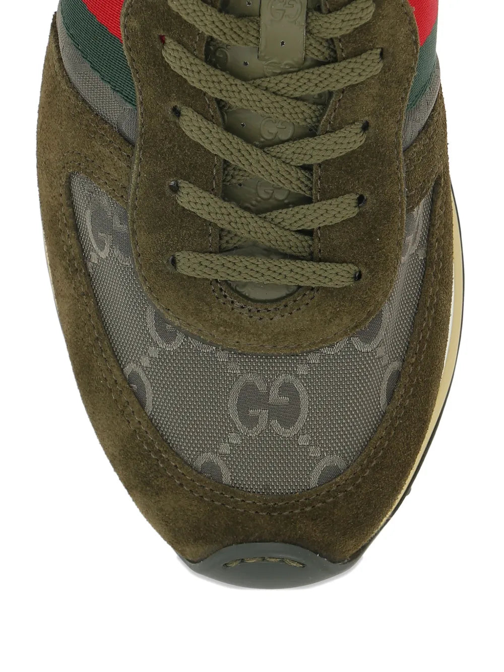 Gucci suede sneaker close-up, olive green toe with GG monogram, lace-up, contrast stripe