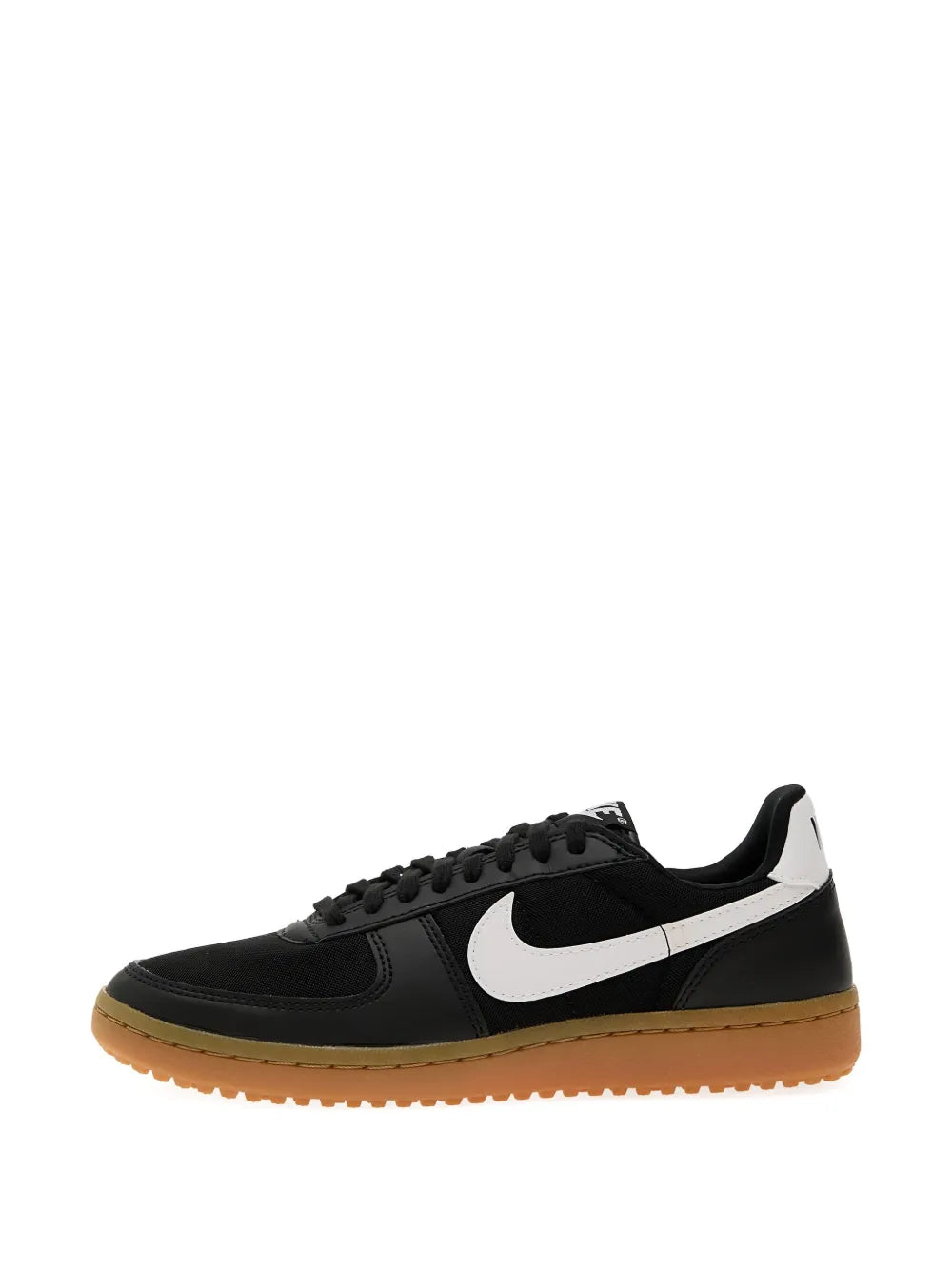 Black low-top lace-up sneaker with white swoosh and gum sole