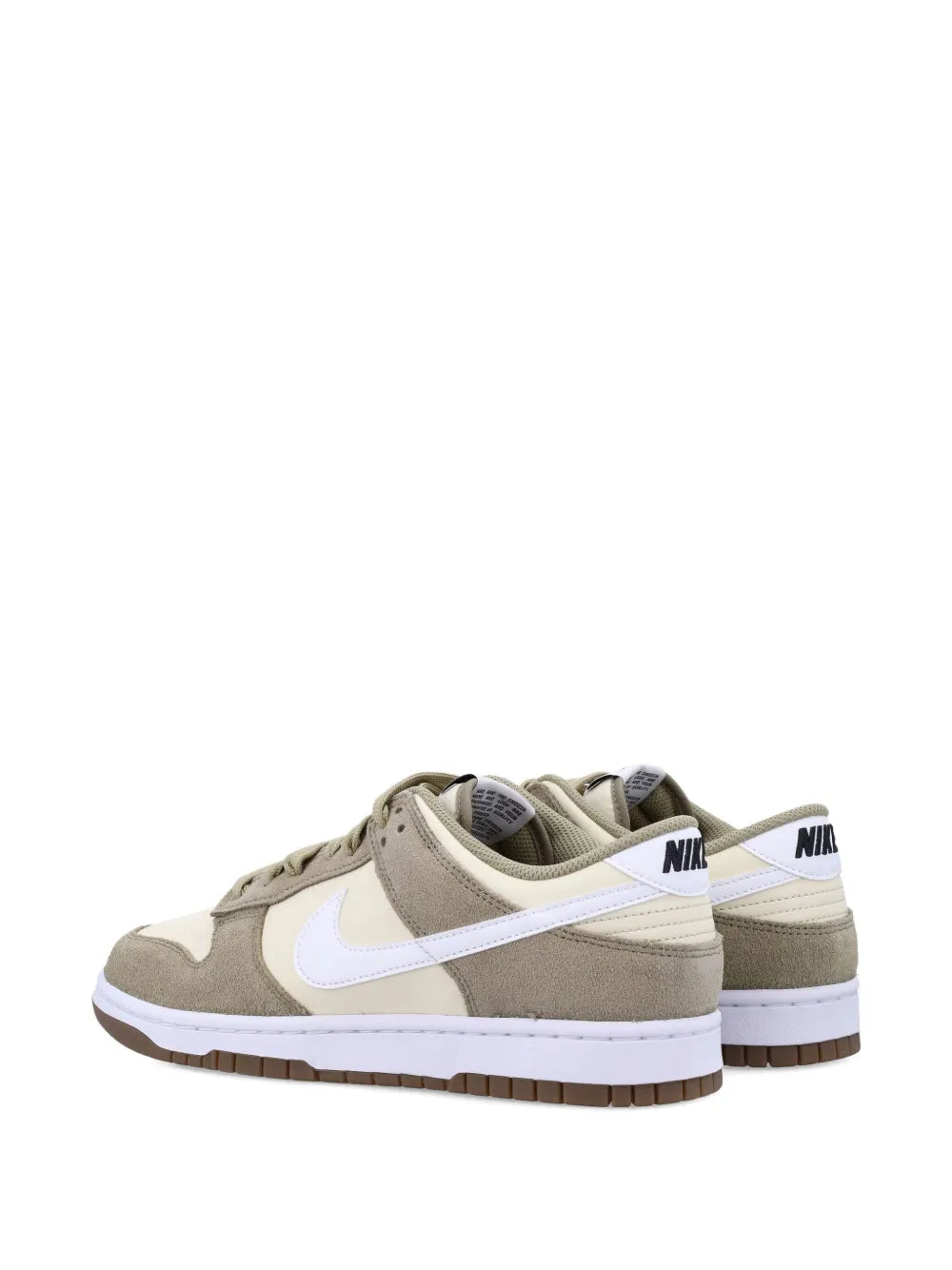 Low-top sneakers with NIKE heel branding, beige/tan uppers, and white swoosh