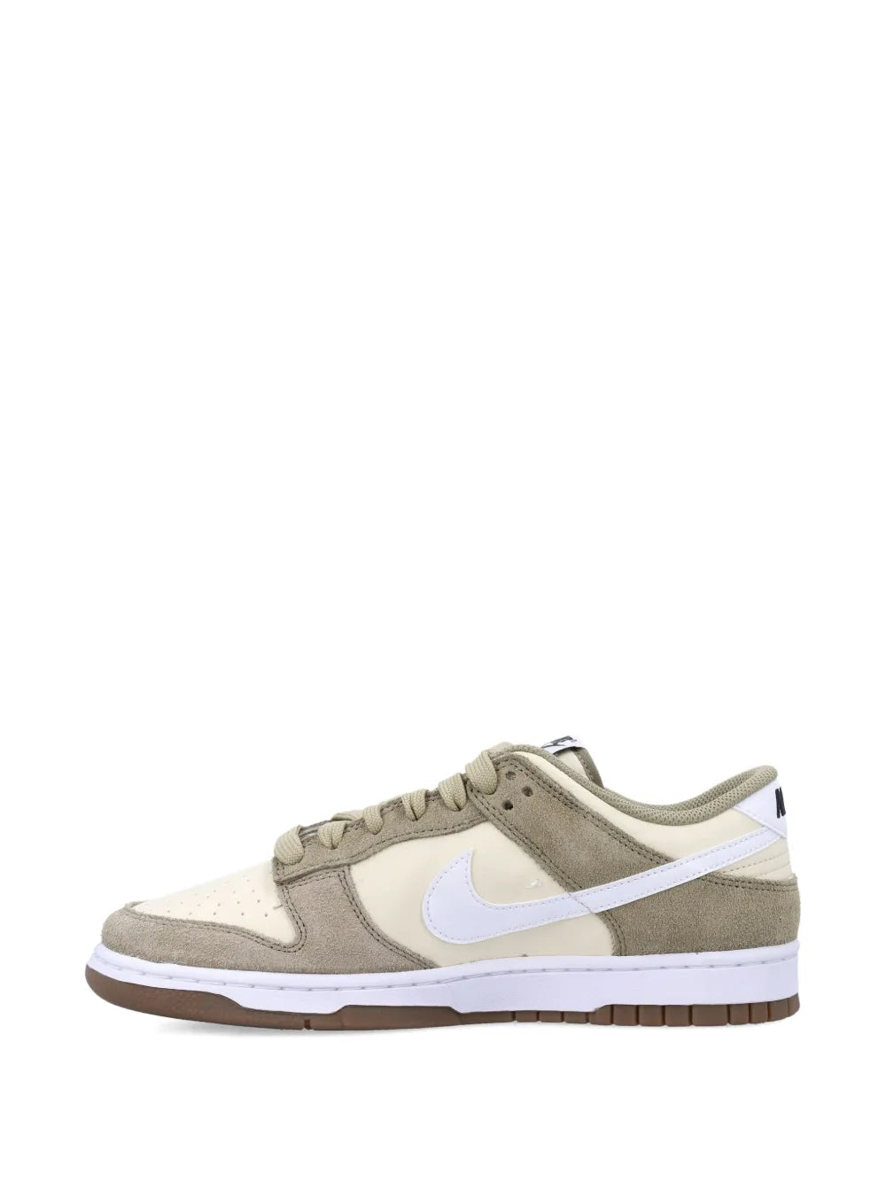 Beige low-top sneakers with tan suede overlays, white swoosh, and rubber cupsole