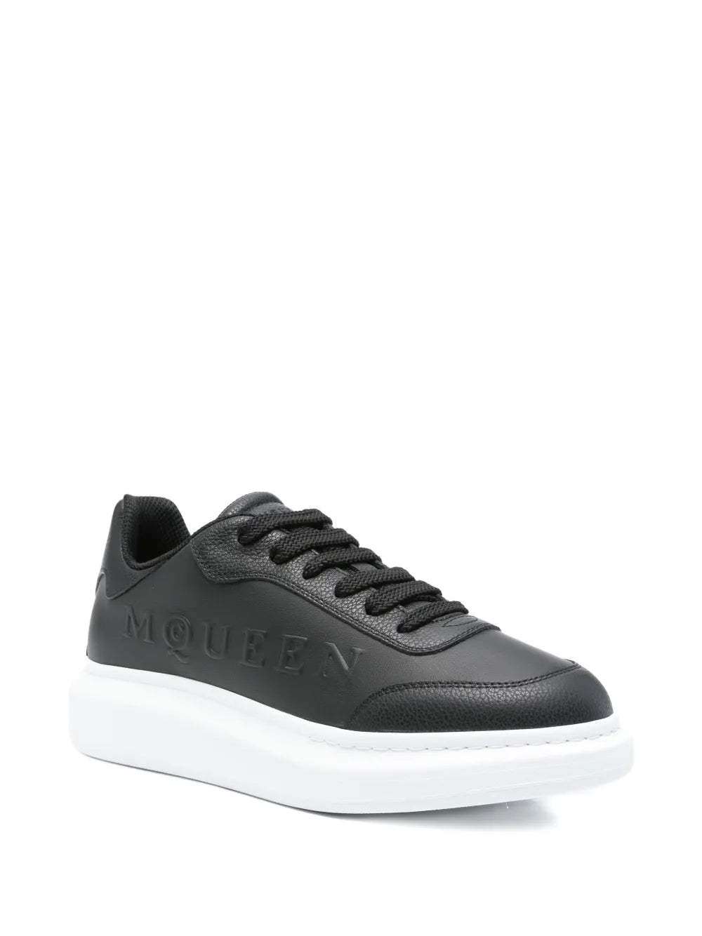 Black logo-embossed platform sneakers with lace-up front and white midsole