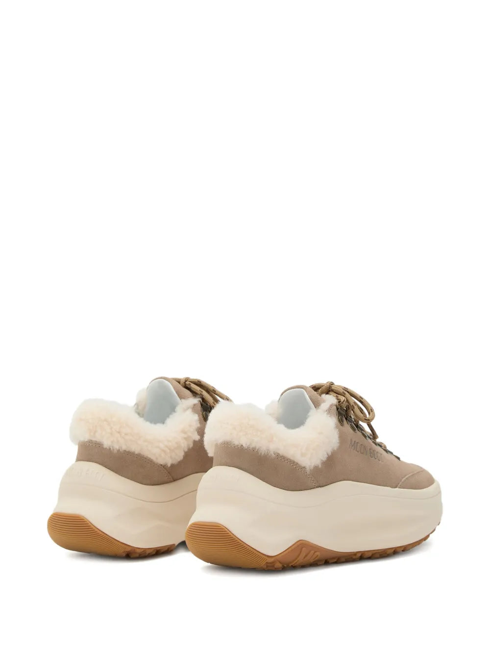 Pair of beige shearling platform sneaker boots, rounded toe and chunky sole