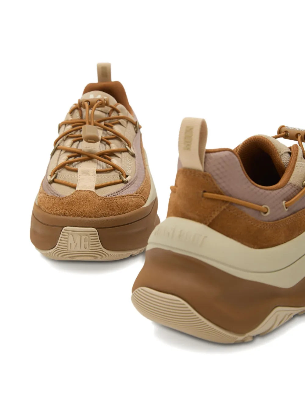 Light brown lace-up sneakers with suede uppers, padded collar, and cream rubber sole