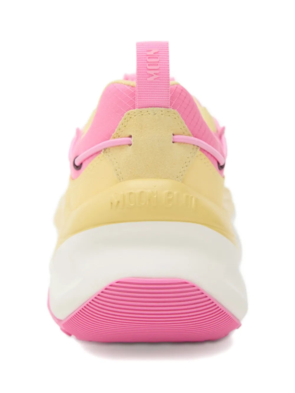 Yellow and pink chunky sneakers, back view with pink pull tab and ridged sole
