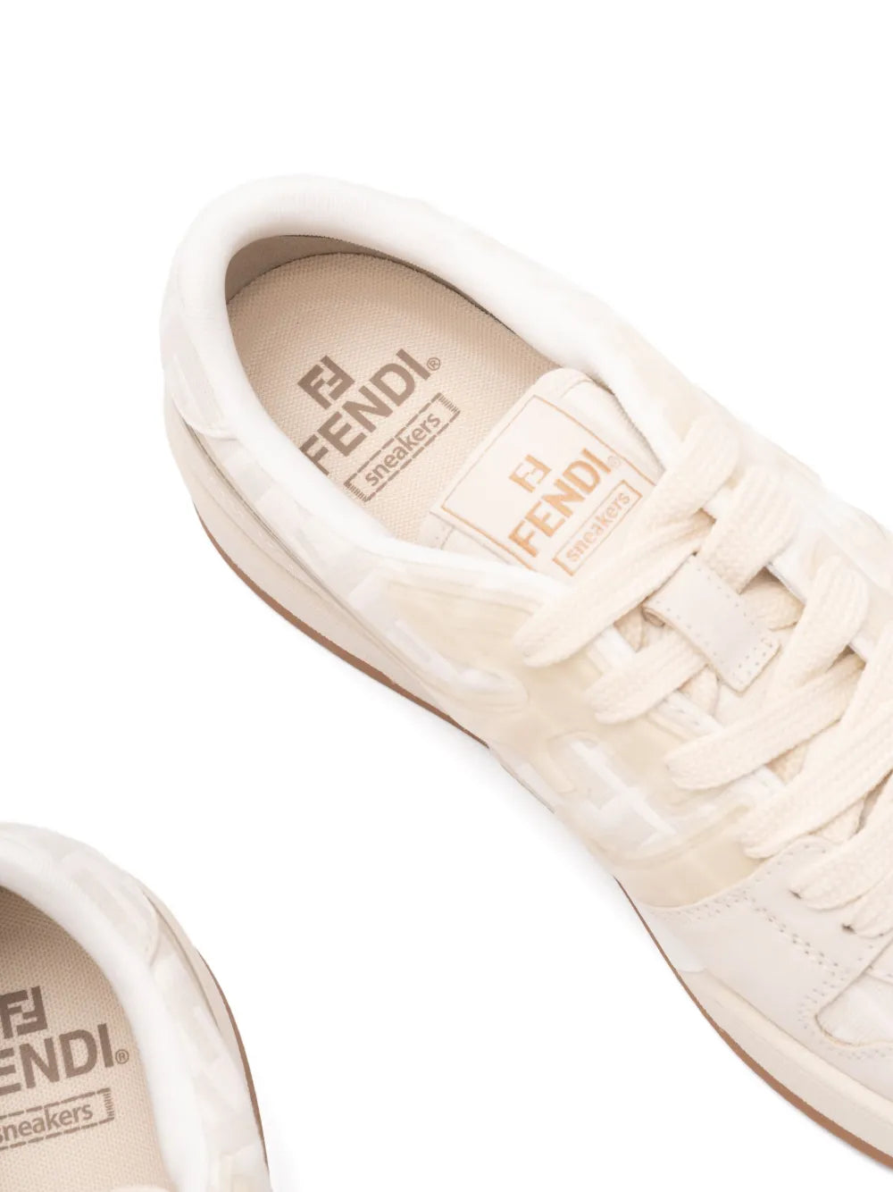 Beige suede sneaker interior view with Fendi tongue logo and laces