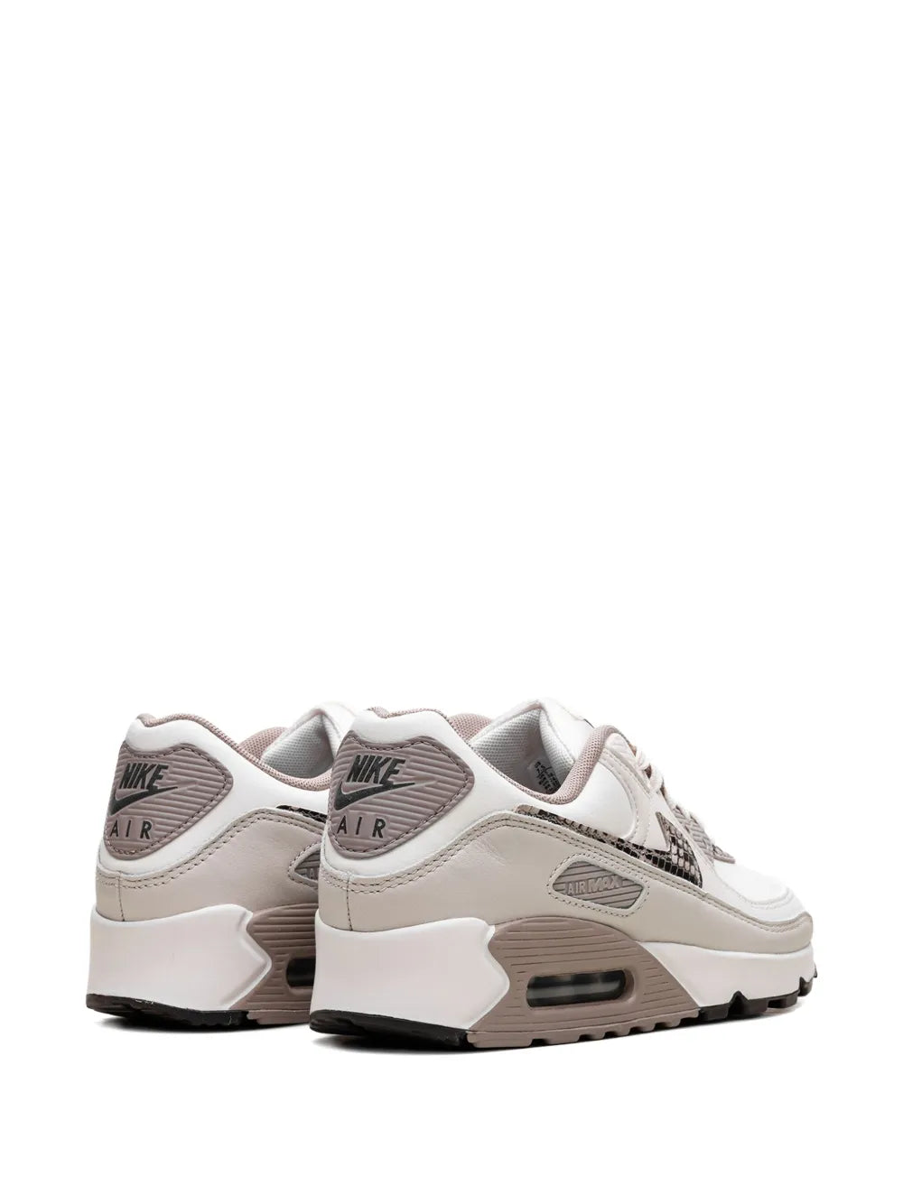 White and light-brown lace-up sneakers with rear Air Max branding and padded heel