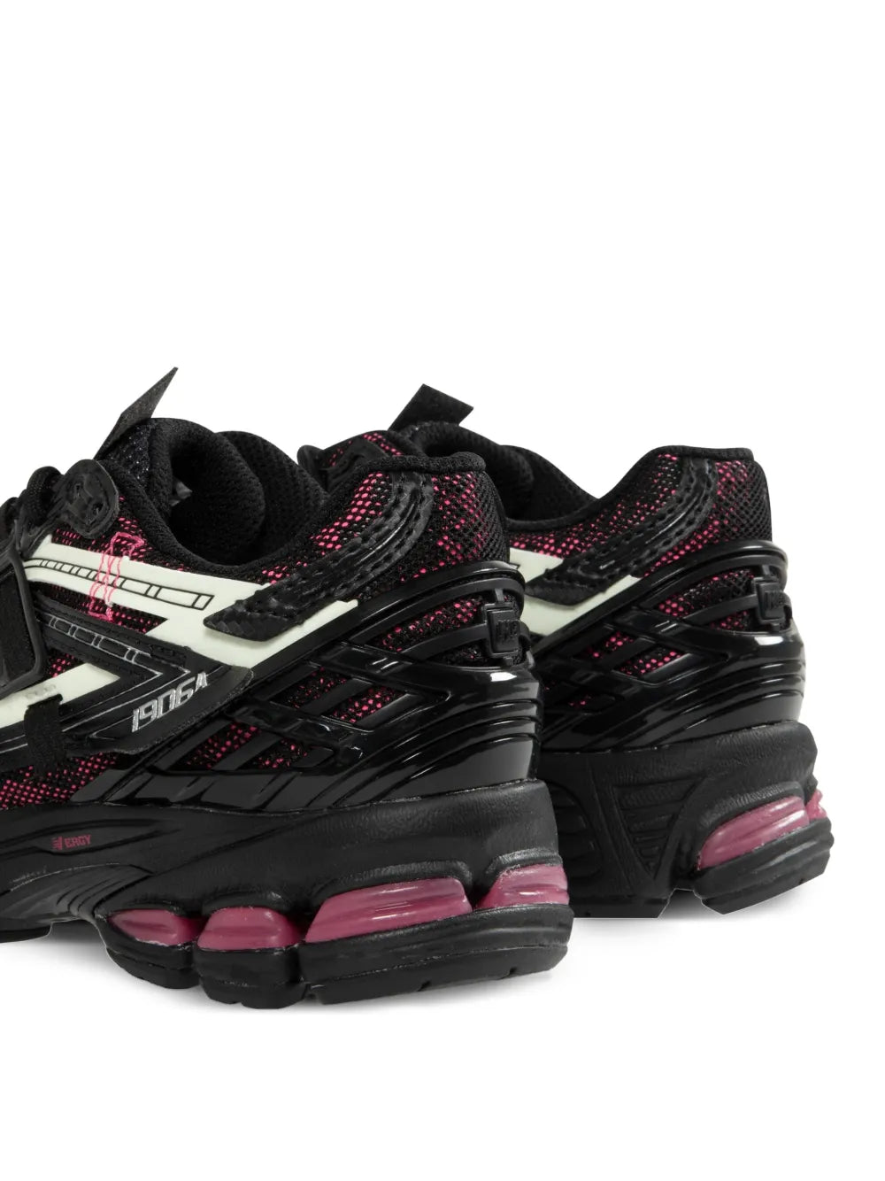 Black lace-up running shoes with TPU cage and pink-tinted midsole accents, side view