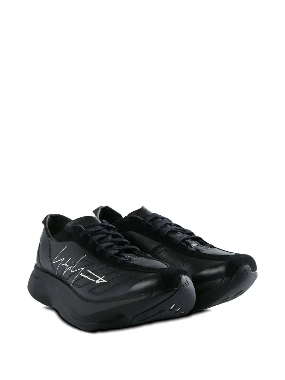 Black leather lace-up trainers with signature-style graphic and textured sole tread.