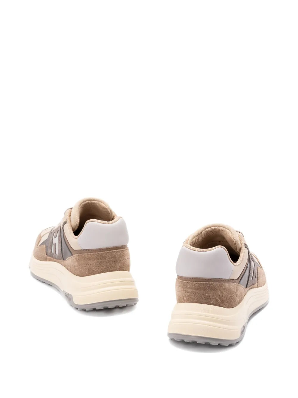 Beige sneakers, rear view with padded collar and chunky white sole