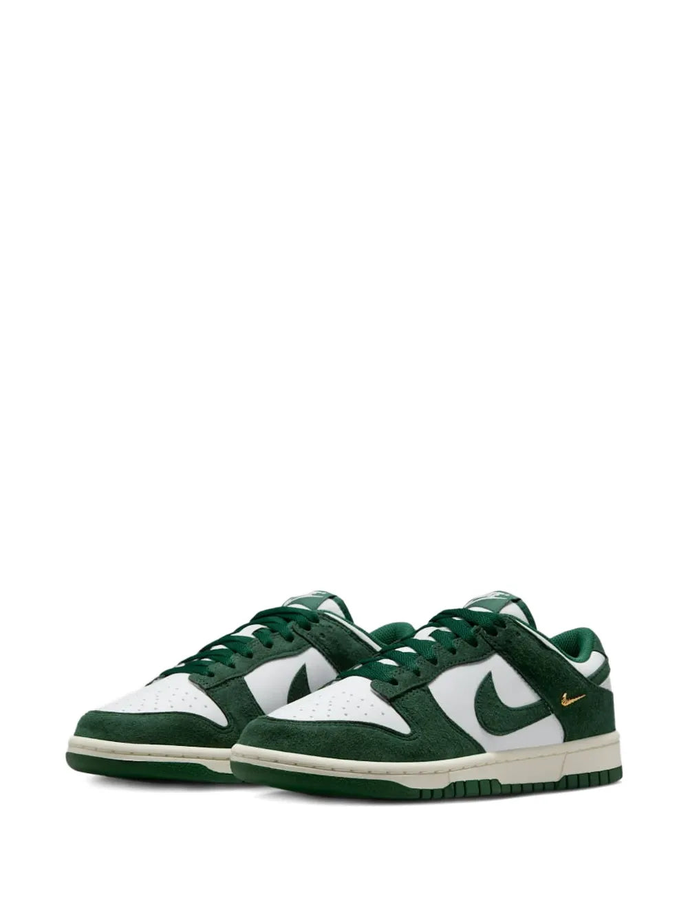 Pair of Nike low-top sneakers, white and dark green with swoosh logos, green laces