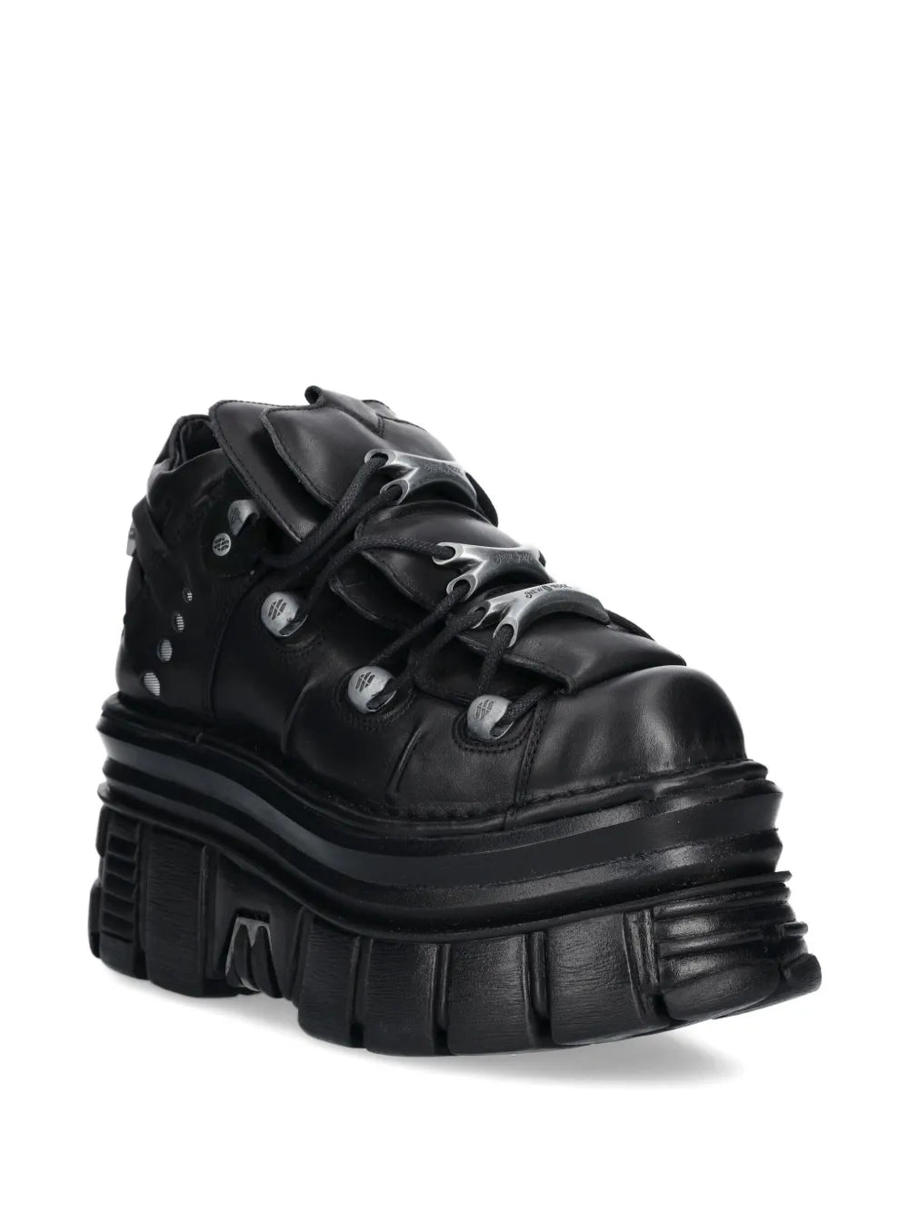 Black platform lace-up trainers, side view with rugged ribbed sole.