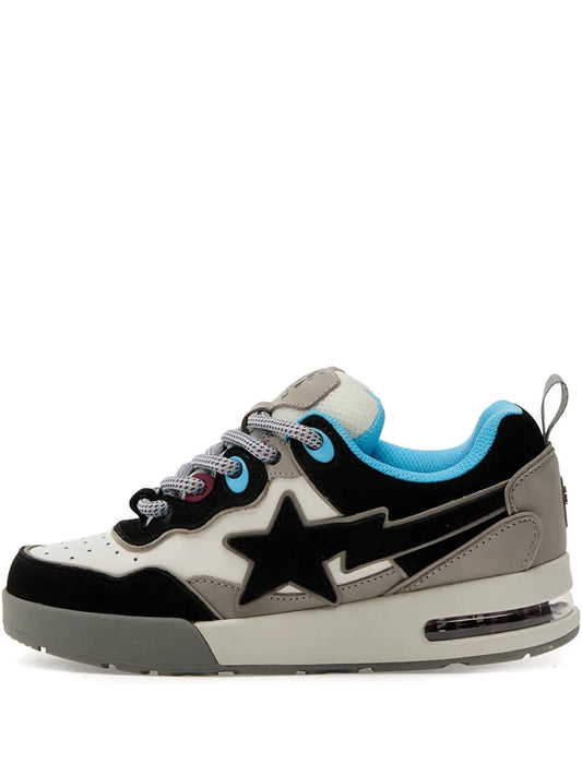 Low-top lace-up sneakers with black and gray panels, white star, blue accents