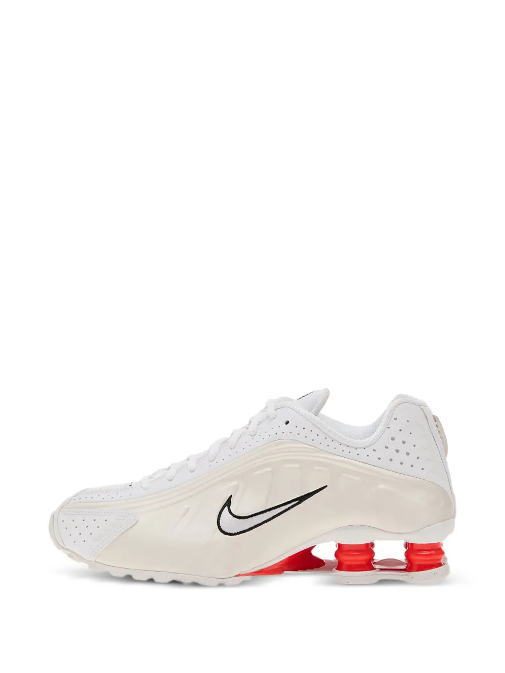 White Shox R4 sneaker side view with black swoosh and red heel pods