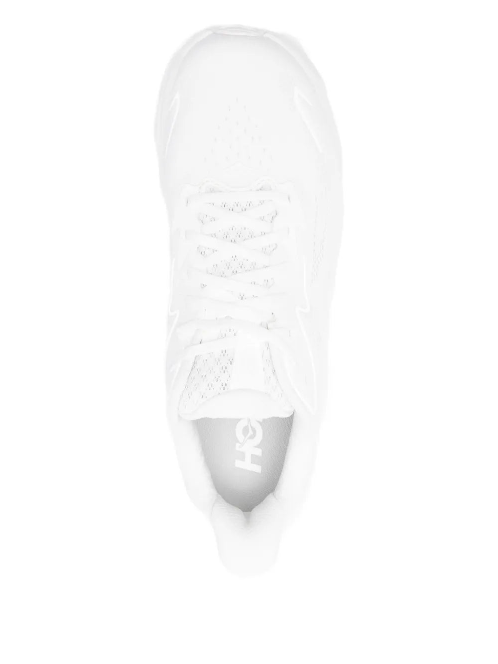 Hoka white sneaker heel and tongue showing brand logo