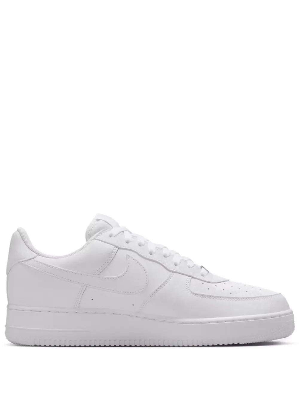Nike Air Force 1 Low sneakers, white leather, side profile with lace-up