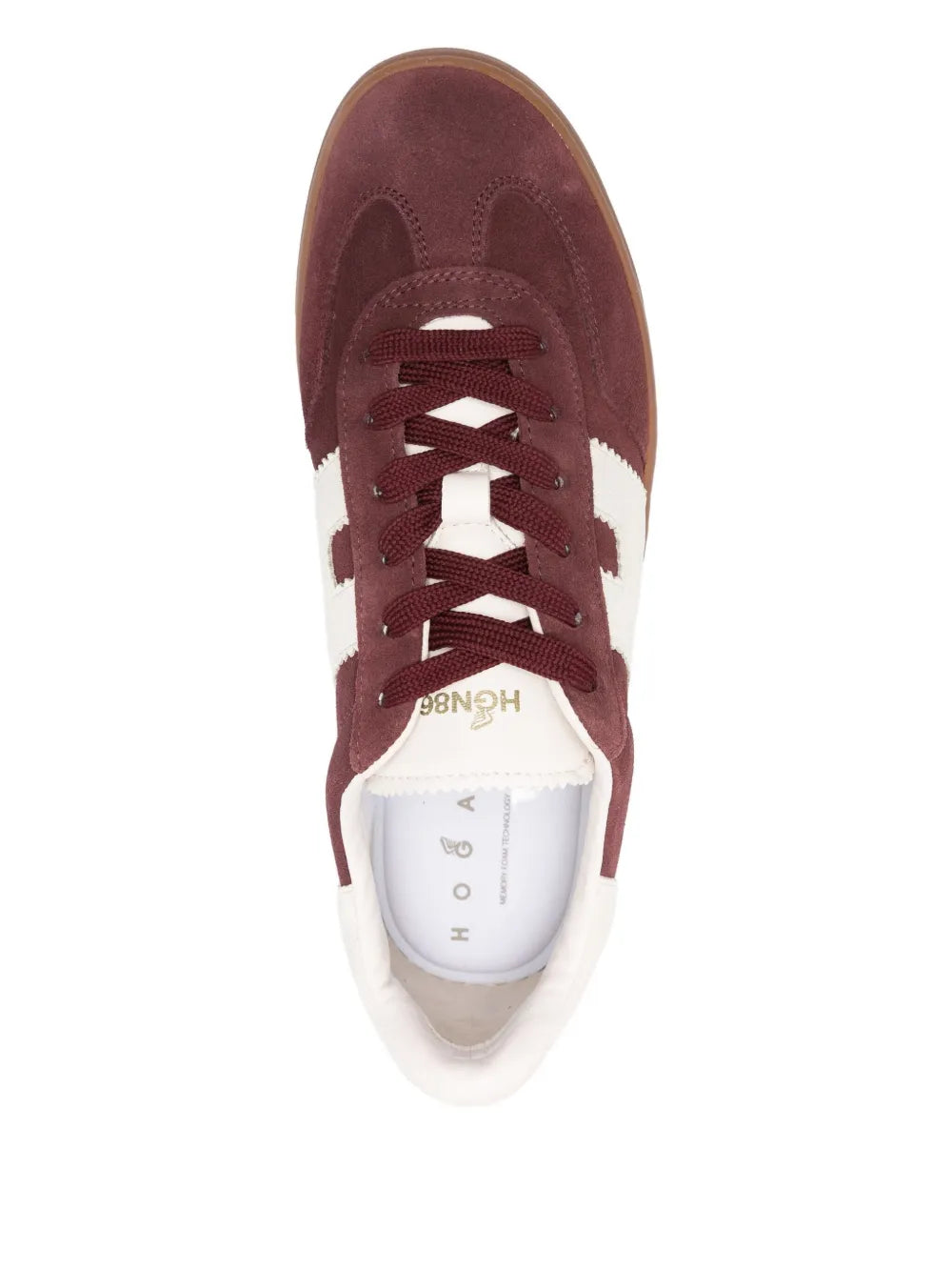 Burgundy sneakers top view with white lining, lace-up eyelets, logo patch tongue