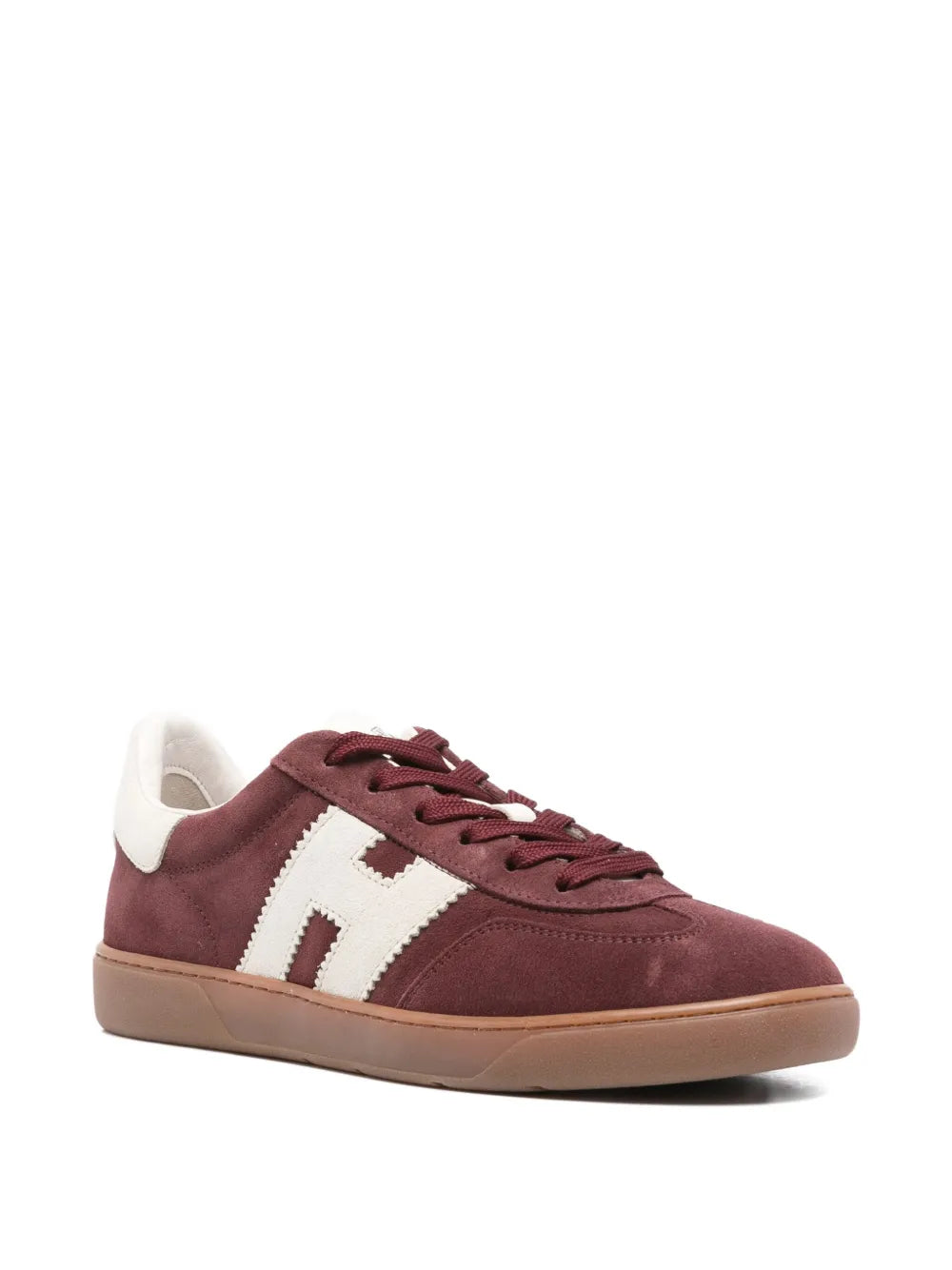 Burgundy low-top sneakers, white logo patch on side, lace-up front