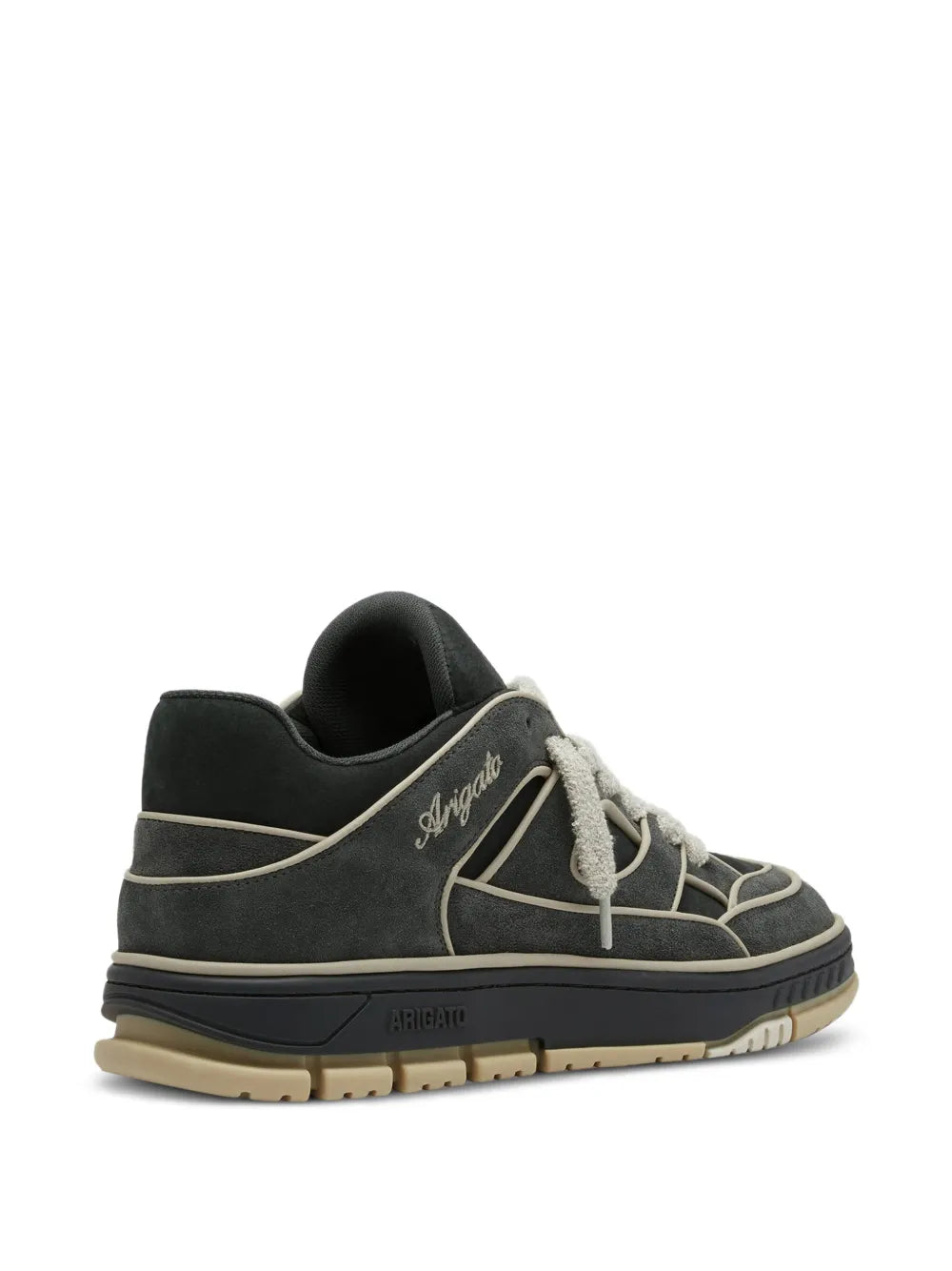 Black suede low-top sneakers side view with cream laces and beige outsole