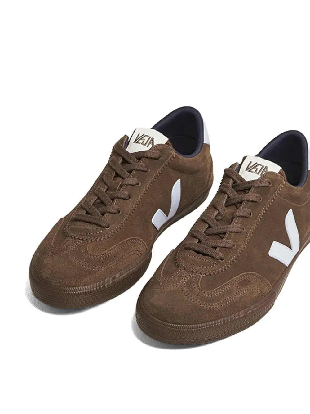 Pair of brown suede lace-up sneakers with white VEJA V logo and dark collars