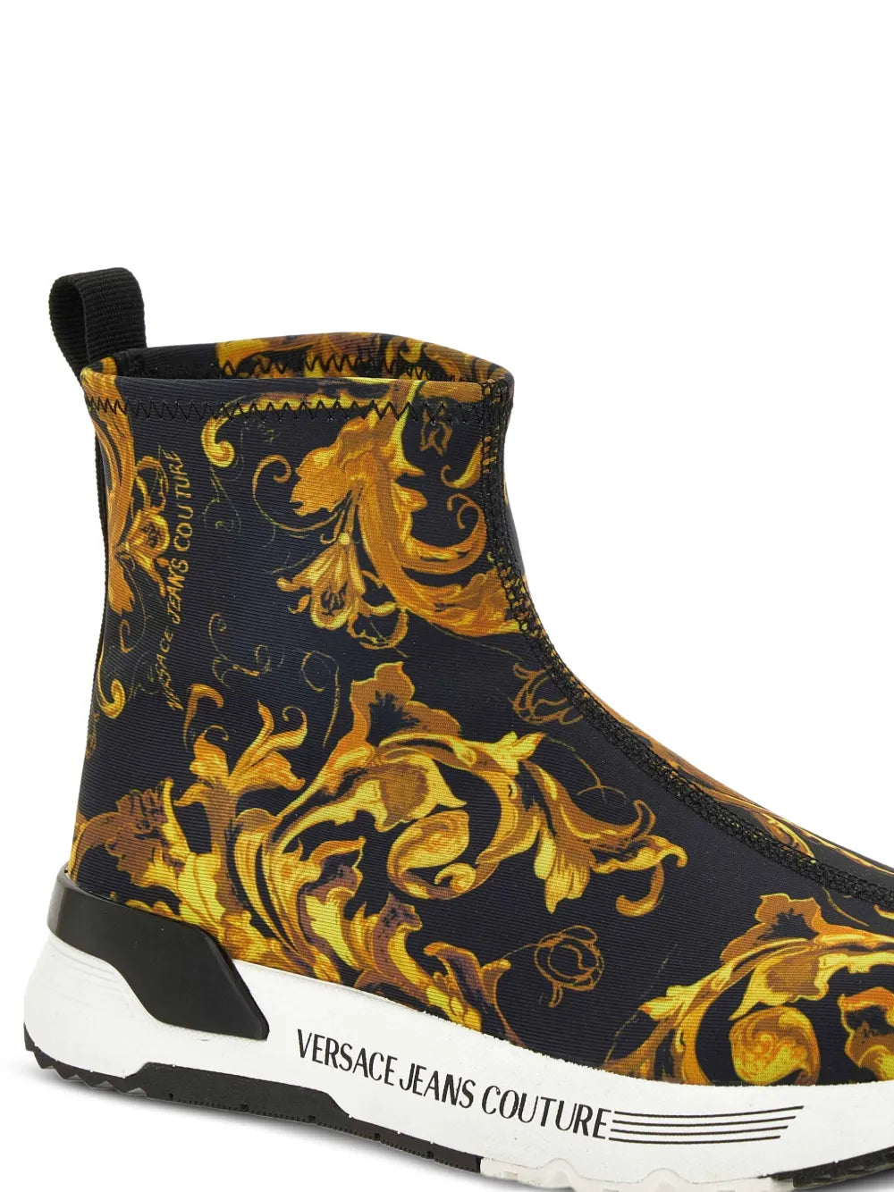 Baroque-print slip-on ankle boot with gold motifs on dark upper and white sole
