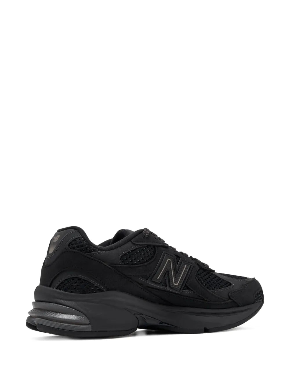 Black New Balance mesh-panelled sneakers, side view with low-profile sole