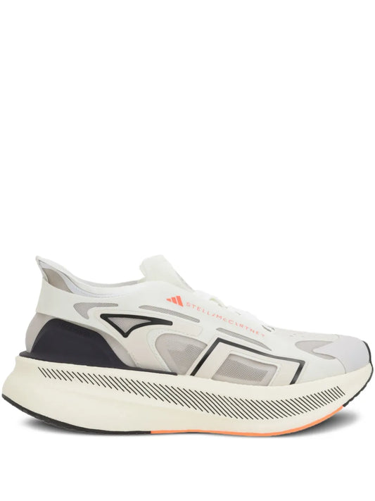 White mesh running shoe with black heel panel, gray graphic and thick Boost midsole