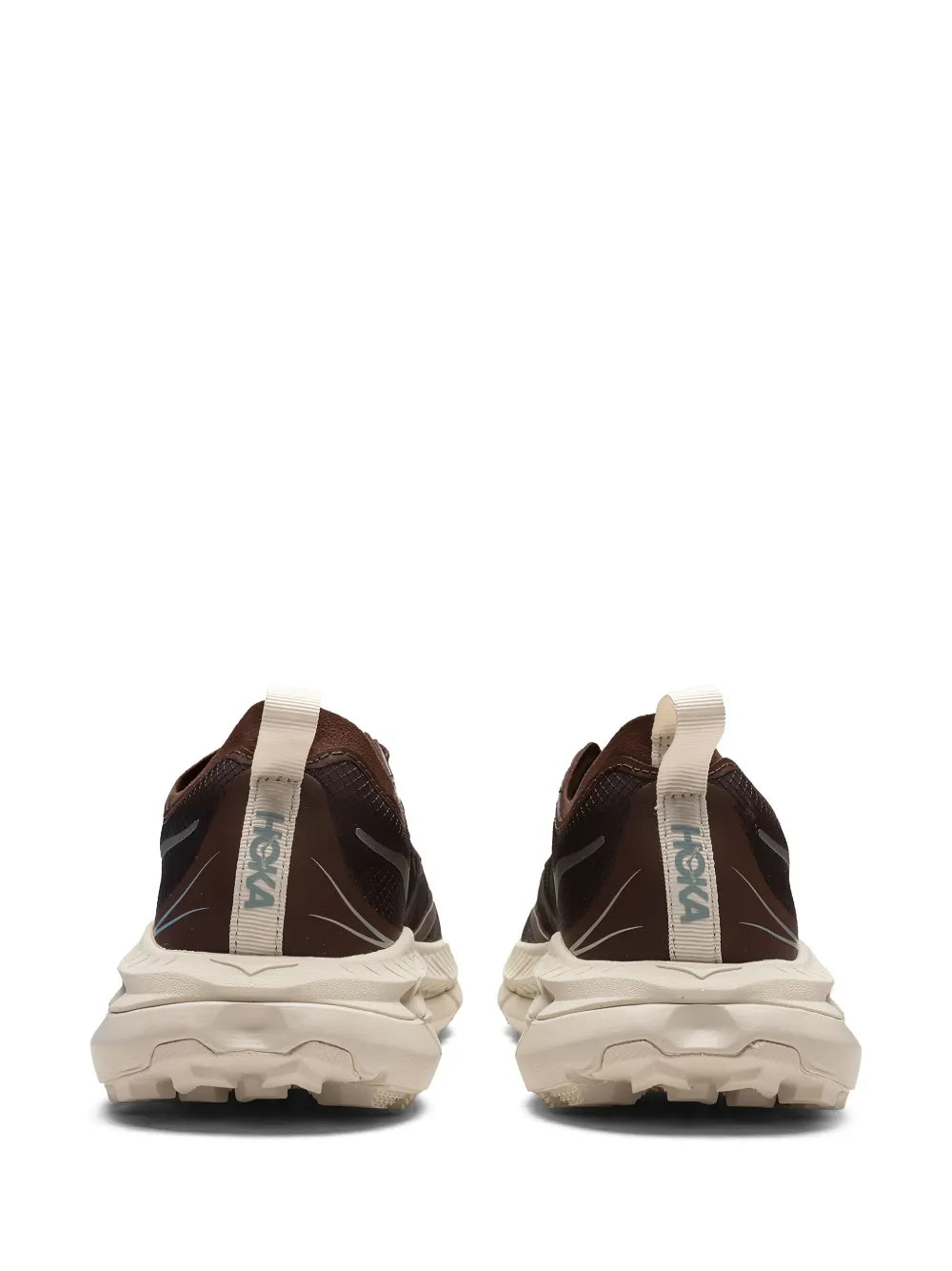 Brown sneakers with HOKA logo on tongue and thick white heel tread sole