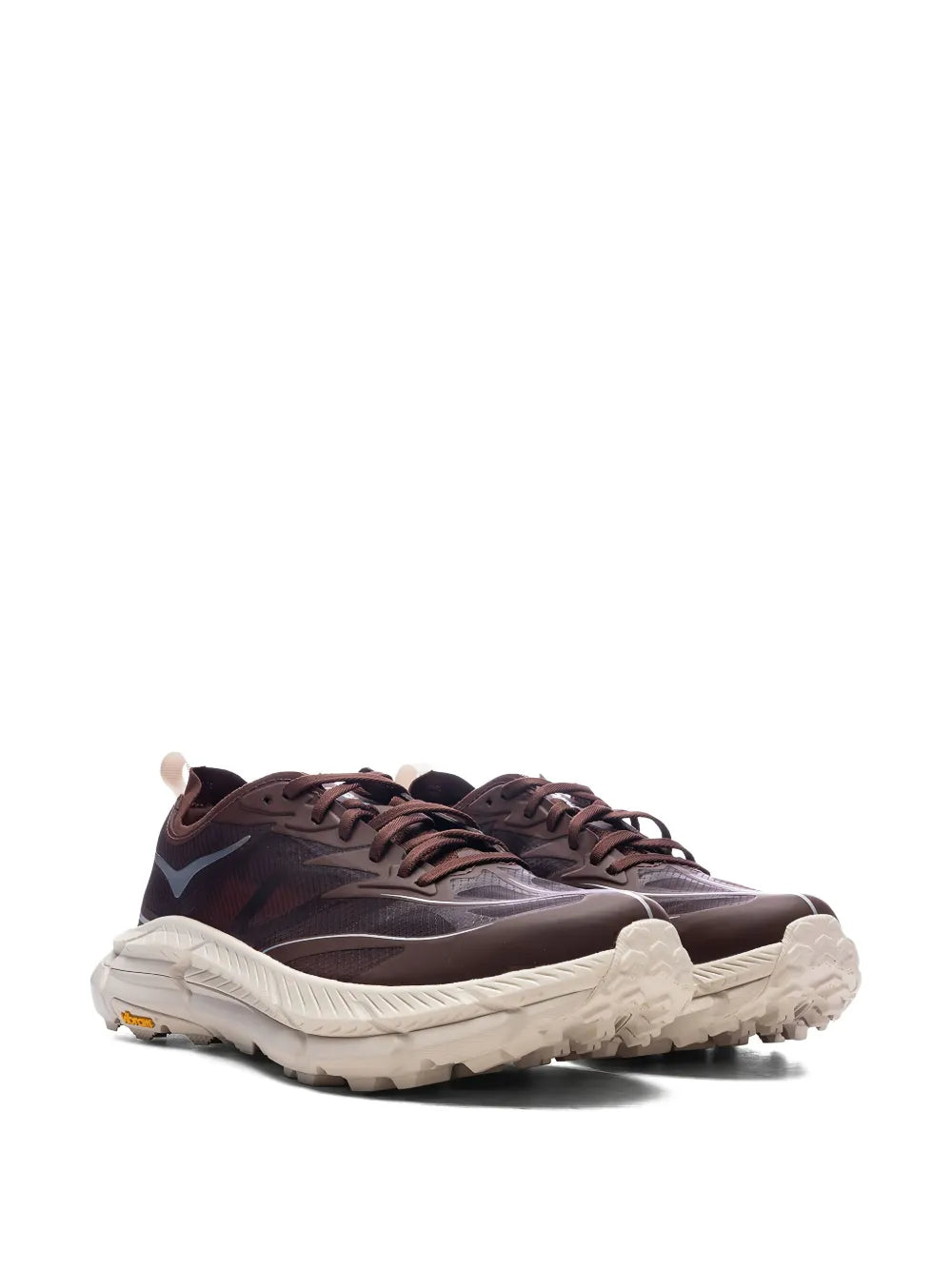 Brown lace-up sneakers with dark upper panels and thick white treaded outsole
