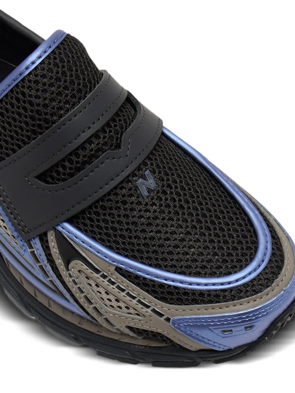 Black mesh slip-on sneaker detail with Velcro strap and blue piping