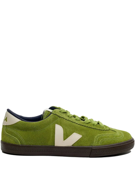 Green suede lace-up sneakers with VEJA white V logo and dark rubber sole