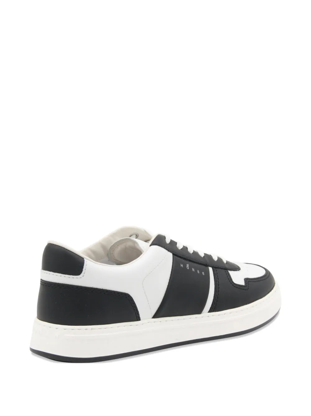Black and white leather panelled low-top sneakers with white laces and flat sole