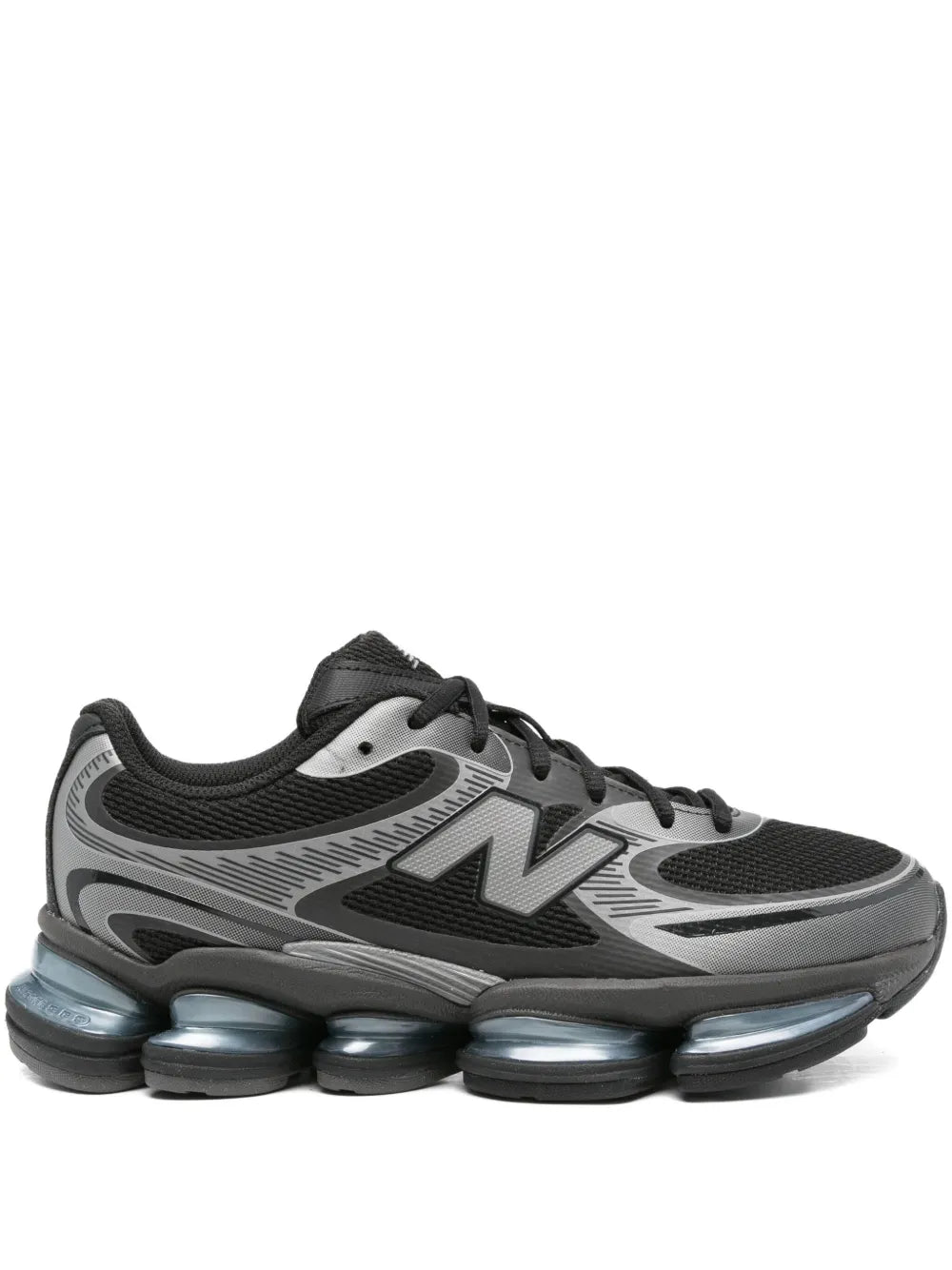 Black and gray running sneakers with N logo, lace-up, and blue-cushioned sole